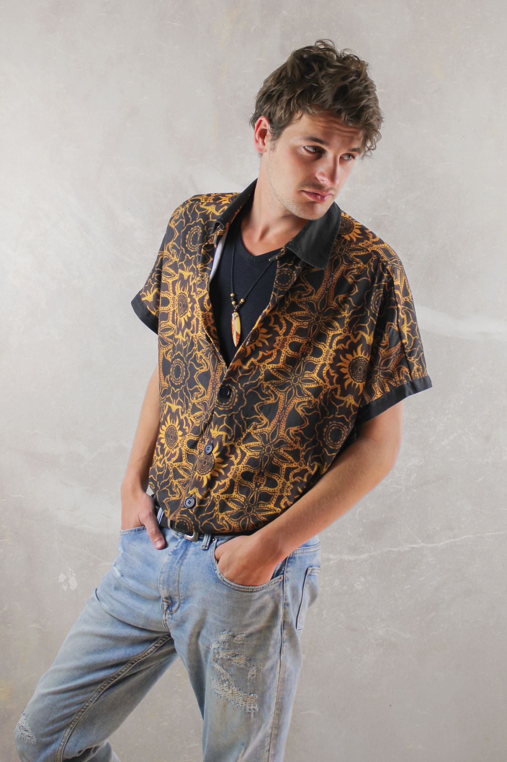 Front view of Exotic Flower Oversized Buttonup Shirt, showcasing captivating floral design and relaxed fit