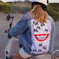 The joker style denim jacket with laughing mouth design