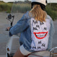 The joker style denim jacket with laughing mouth design