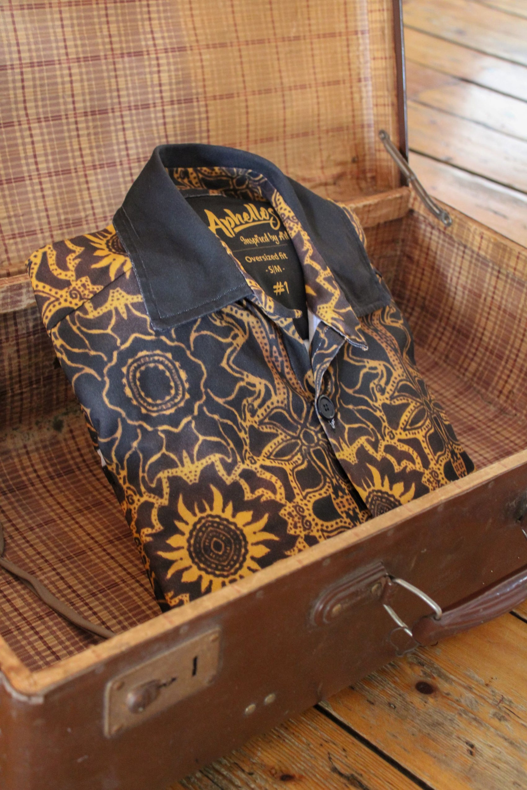 a closeup of the helios oversized mens button-up shirt by Aphellos