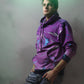a purple hoodie with an old school 80s retro arcade style