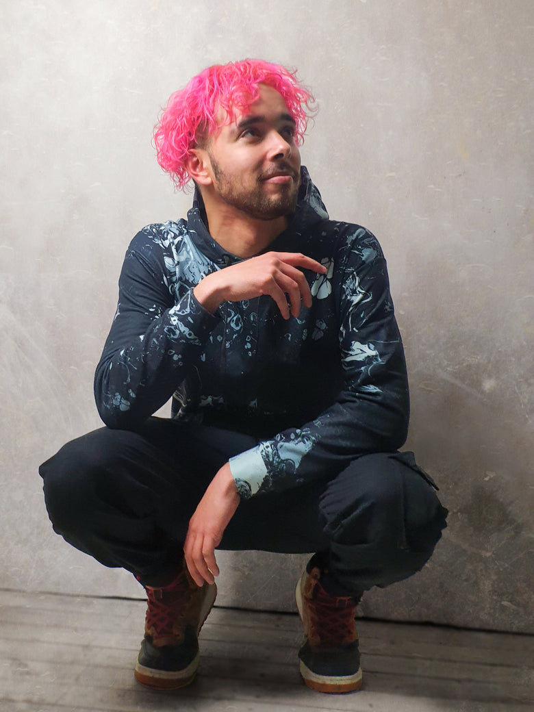 Aphellos' Black Marble hoodie with a marble/stone-like design pattern in black, white and gray