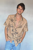 The Lovers shirt with short sleeves in a warm camel colored aesthetic
