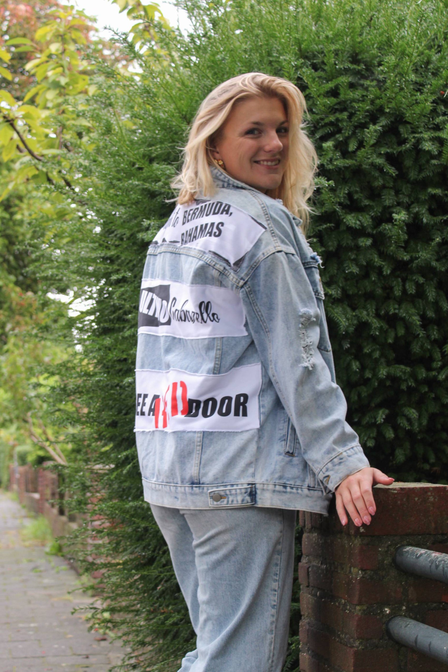 Customized oversized denim jacket with large soft panels on the back, offering a cool, artistic twist