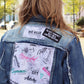 Statement jacket with unique black and white text panels featuring phrases like "uploading..." and "infra-red."