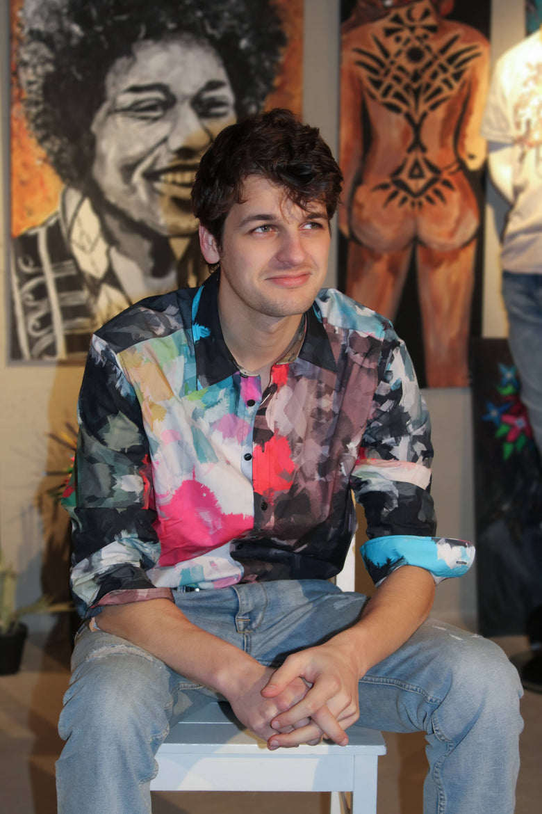 Discover the one-of-a-kind style of our Unique Design Men's Button-Up Shirt, featuring a randomly placed colorful pattern that makes each piece completely unique.