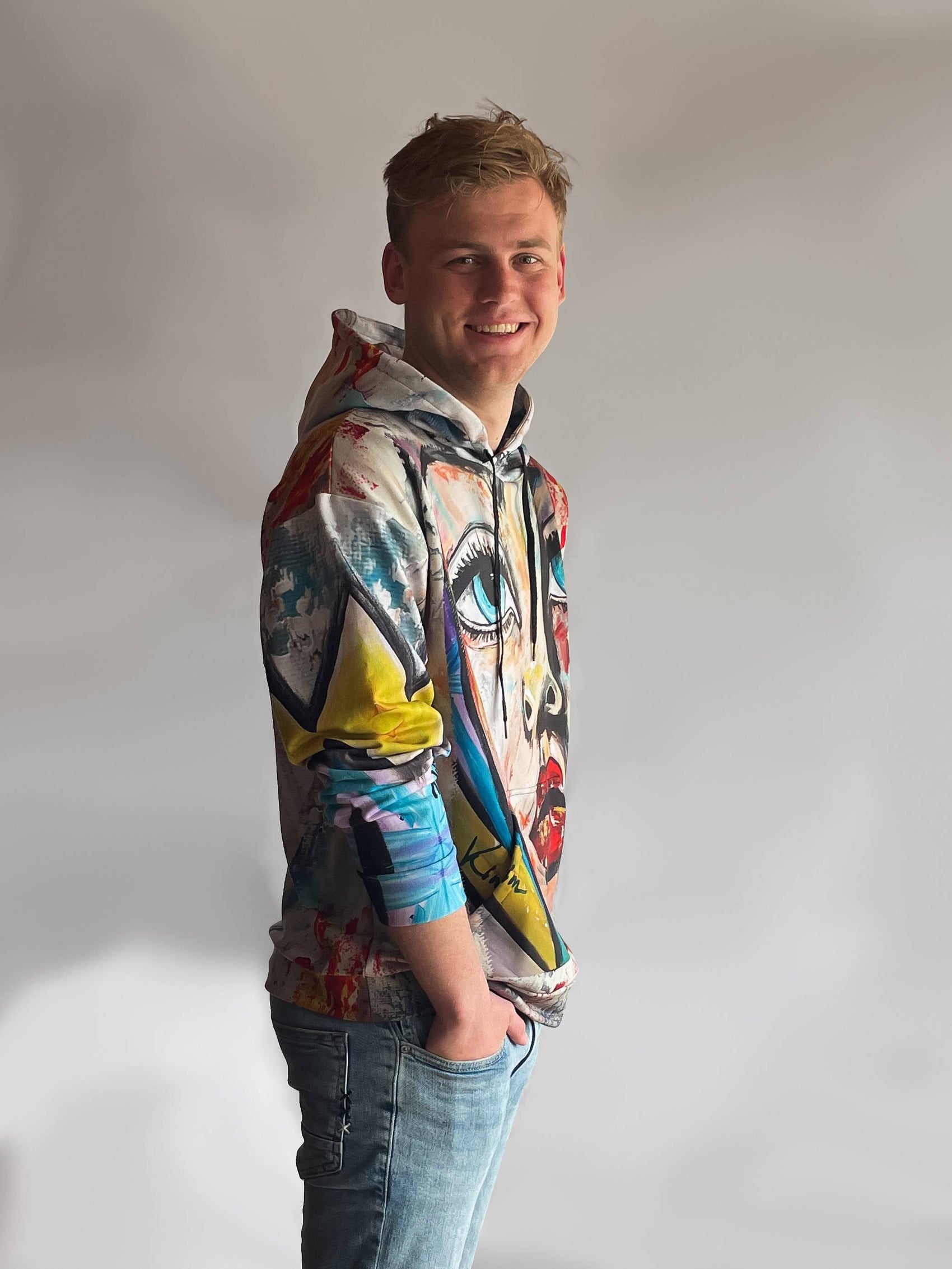 art inspired hoodie with big face on front of artwork design on this hooded sweatshirt