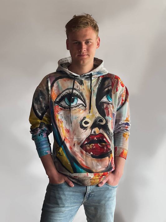 Bright colorful hoodie with summer colors and giant face on front called lush lips