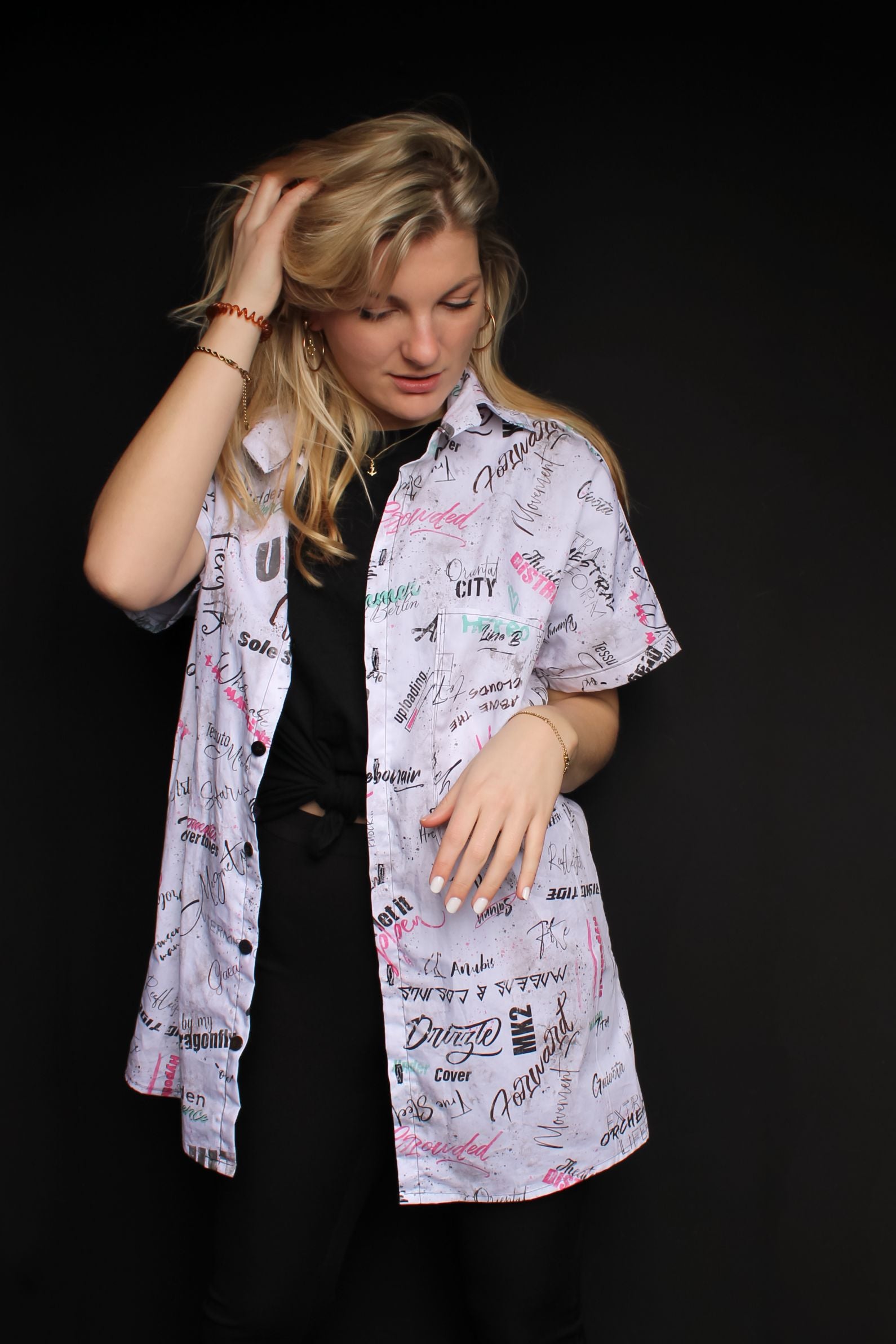 The oversized fit and drop shoulders of our Oriental City Blouse make it a versatile and easy-to-style shirt dress that can be worn alone or layered over other pieces.